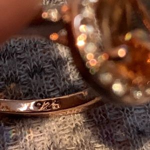 One rose gold over 925 one rose gold plated over stainless steel